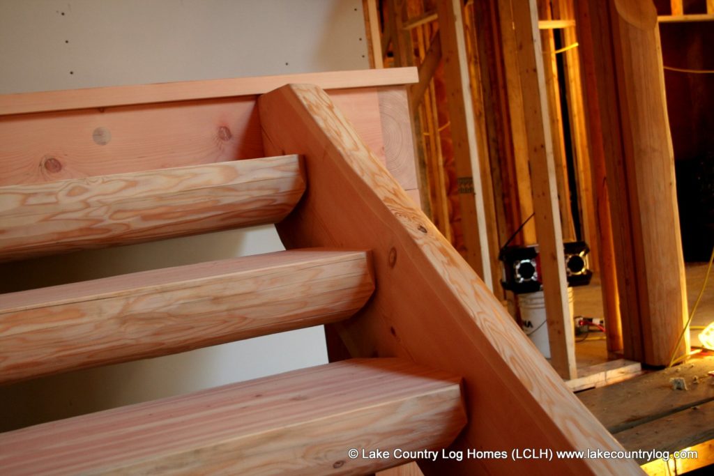 handcrafted log and timber stairs and railings