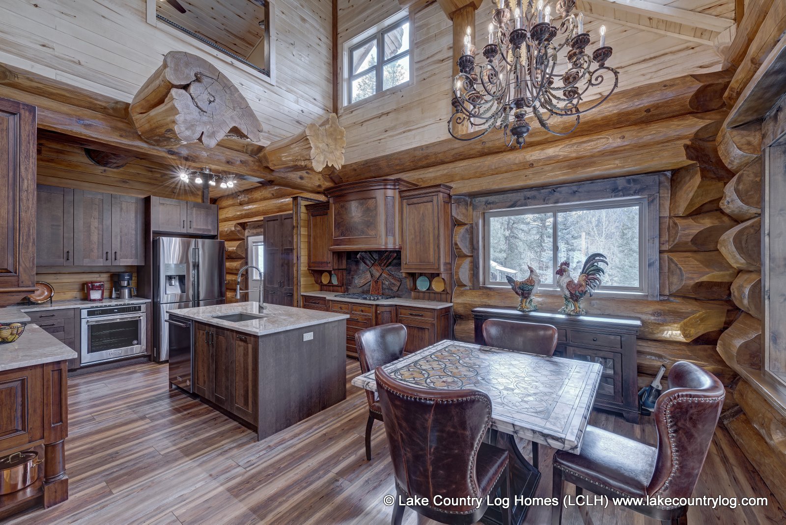 Rustic Luxury: Western Red Cedar Log Cabin Home Kitchen / Dining Room built in Colorado